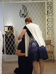 2010 novice Karen J. receives her Dominican scapular.