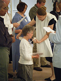 2010 novice Sally W. receives her Dominican scapular.