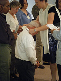 2010 novice Tom W. receives his Dominican scapular.